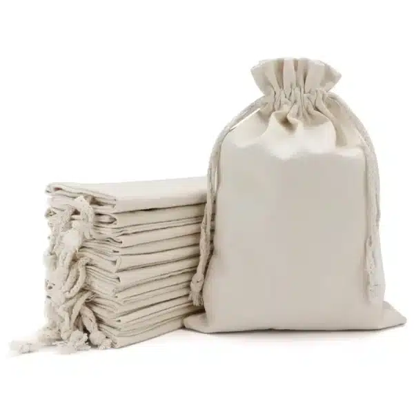 Bolsas de Tela Tocuyo con cordón ajustable en Gamarra personalizadas, con medidas, colores, al por mayor